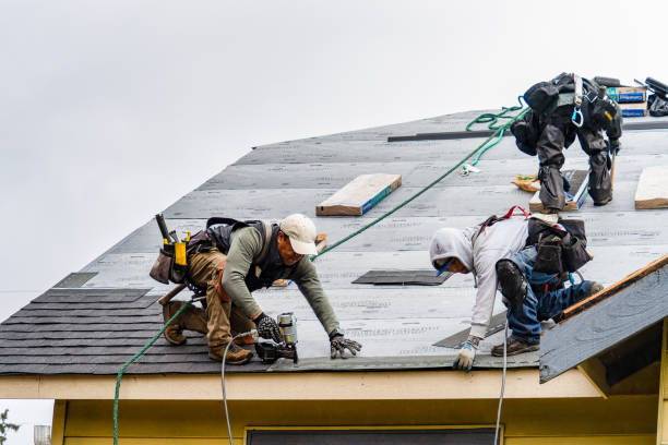 Professional Gutter Installation technician working in Stittville, NY